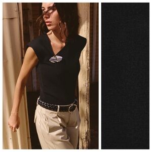 NWT. Zara Black Knit Top with Golden Appliqué. Size S.